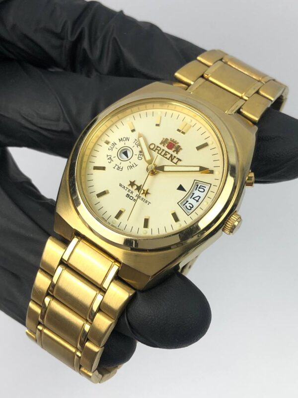 ORIENT TRIPLE STAR DAYDATE AUTOMATIC - Gambar 3