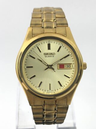 SEIKO QUARTZ ANALOG GOLD TONE CASE ALL ORI