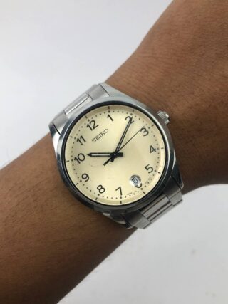Seiko analog cream dial round steel case Steel Bracelet
