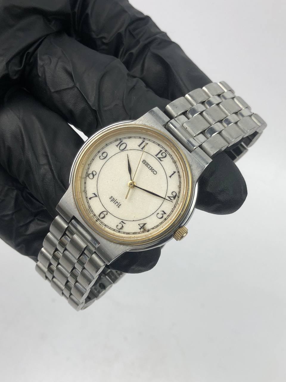 SEIKO SPIRIT ROUND TWO-TONE CASE STEEL BRACELET CREAM ARABIC DIAL - Gambar 4