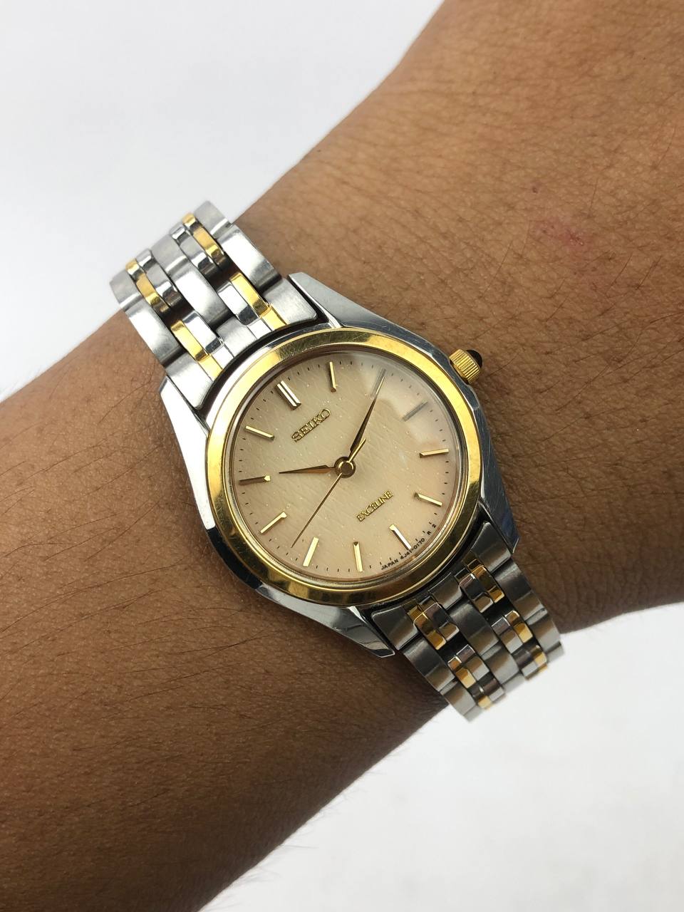 SEIKO EXCELINE GOLD BEZEL CHAMPAGNE DIAL TWO-TONE BRACELET