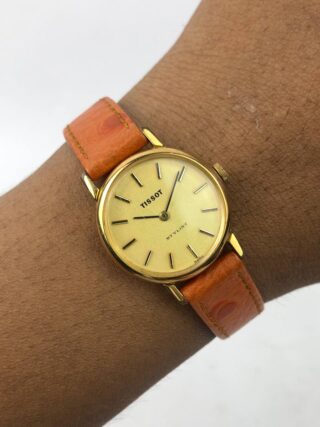 TISSOT STYLIST SWISS DRESS WATCH ROUND GOLD CHAMPAGNE DIAL LEATHER STRAP
