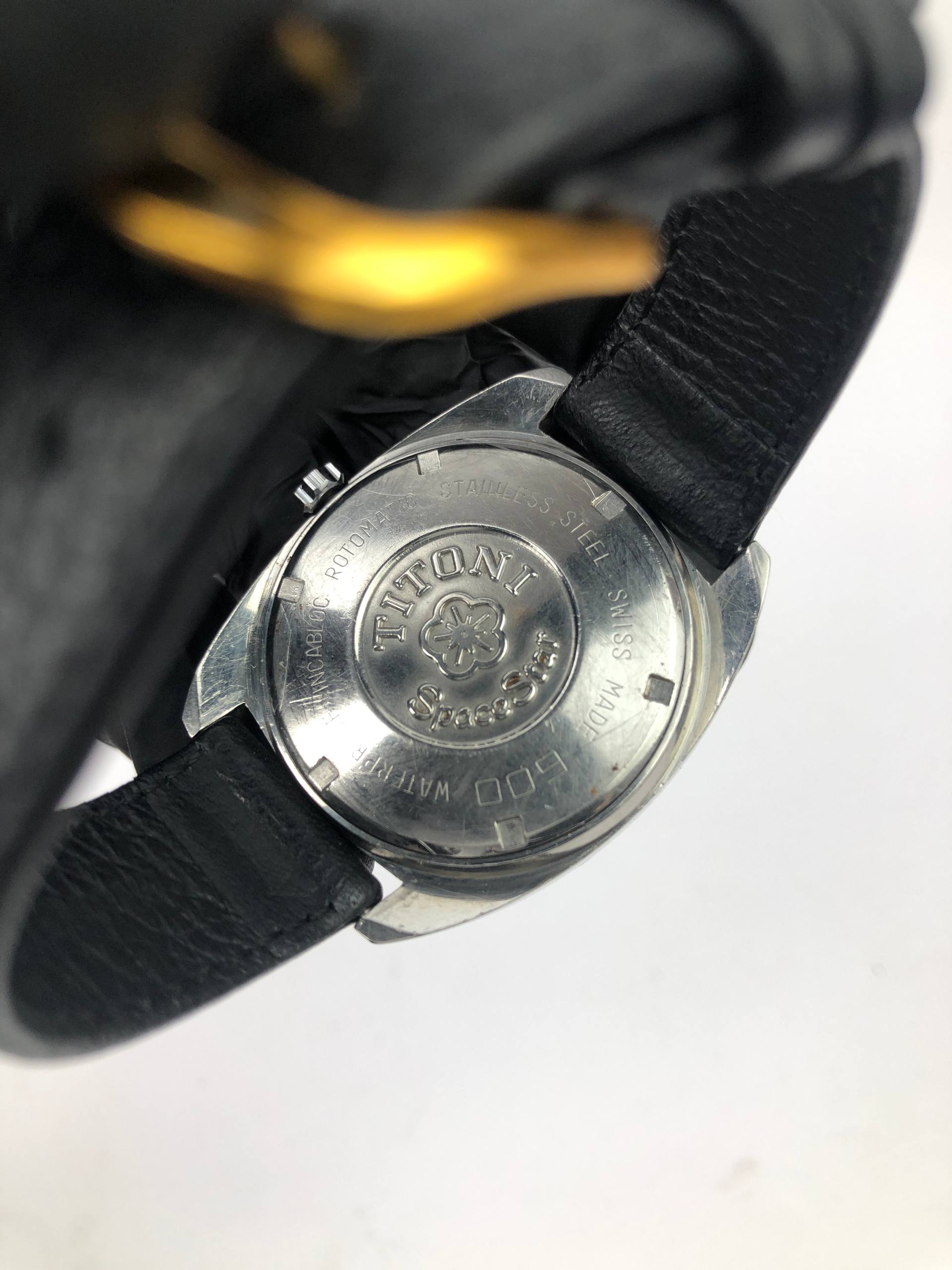 TITONI SPACESTAR DAY DATE - Gambar 7