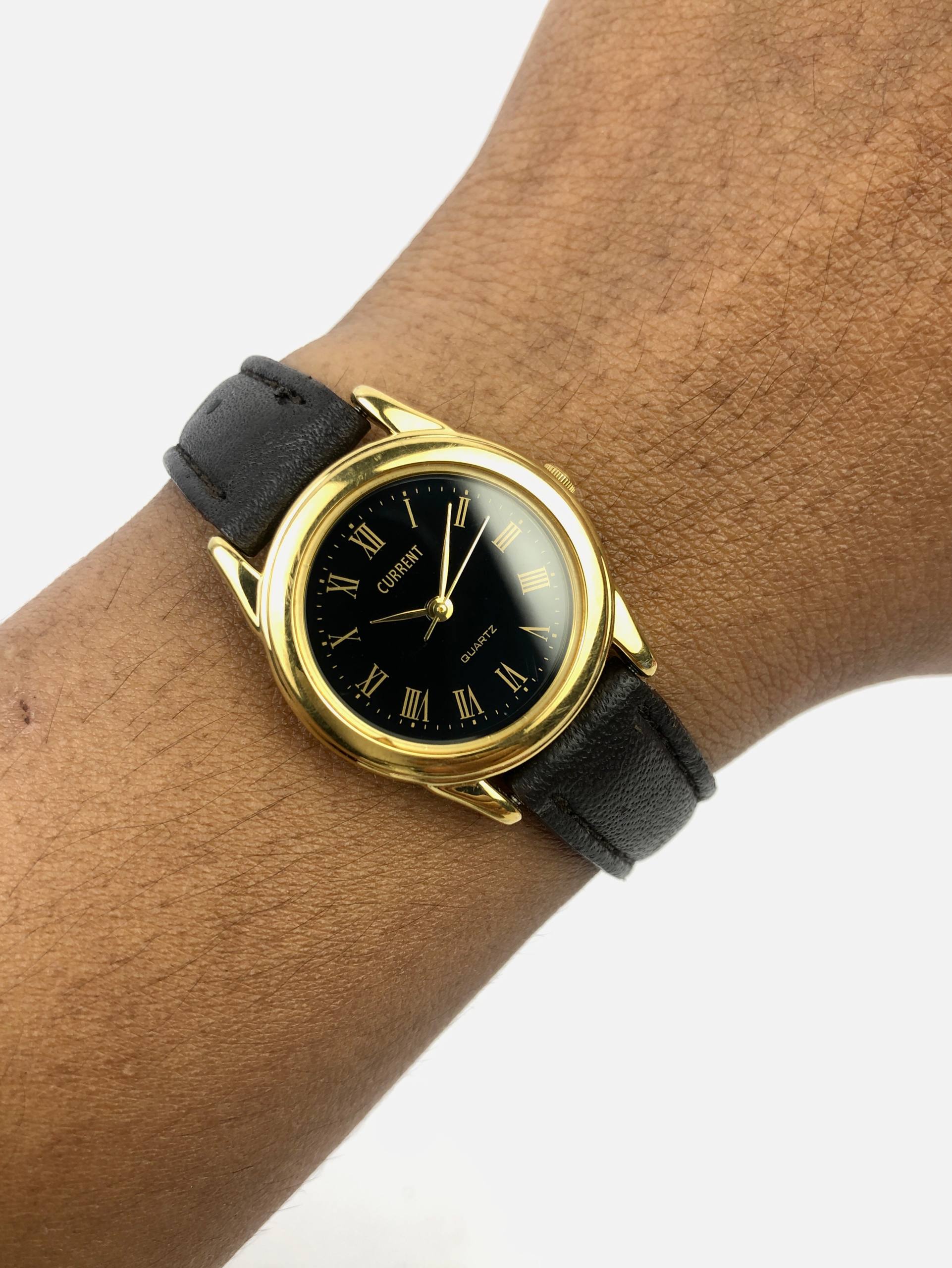 CASIO CURRENT BLACK ROMAN DIAL