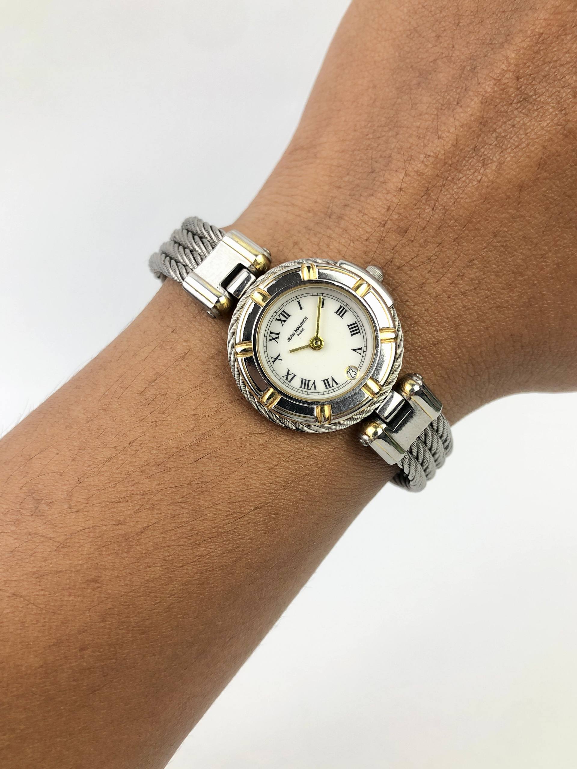 JEAN MAURICE PARIS LADIES TWO TONE ROMAN DIAL CABLE BRACELET DATE