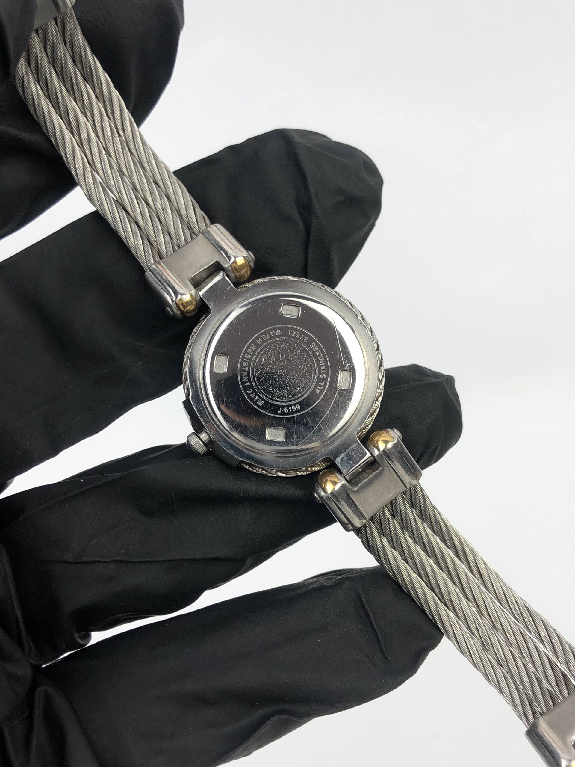 JEAN MAURICE PARIS LADIES TWO TONE ROMAN DIAL CABLE BRACELET DATE - Gambar 8