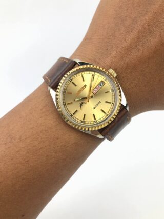 CORNAVIN QUARTZ DAY DATE GOLD DIAL FLUTED BEZEL VINTAGE