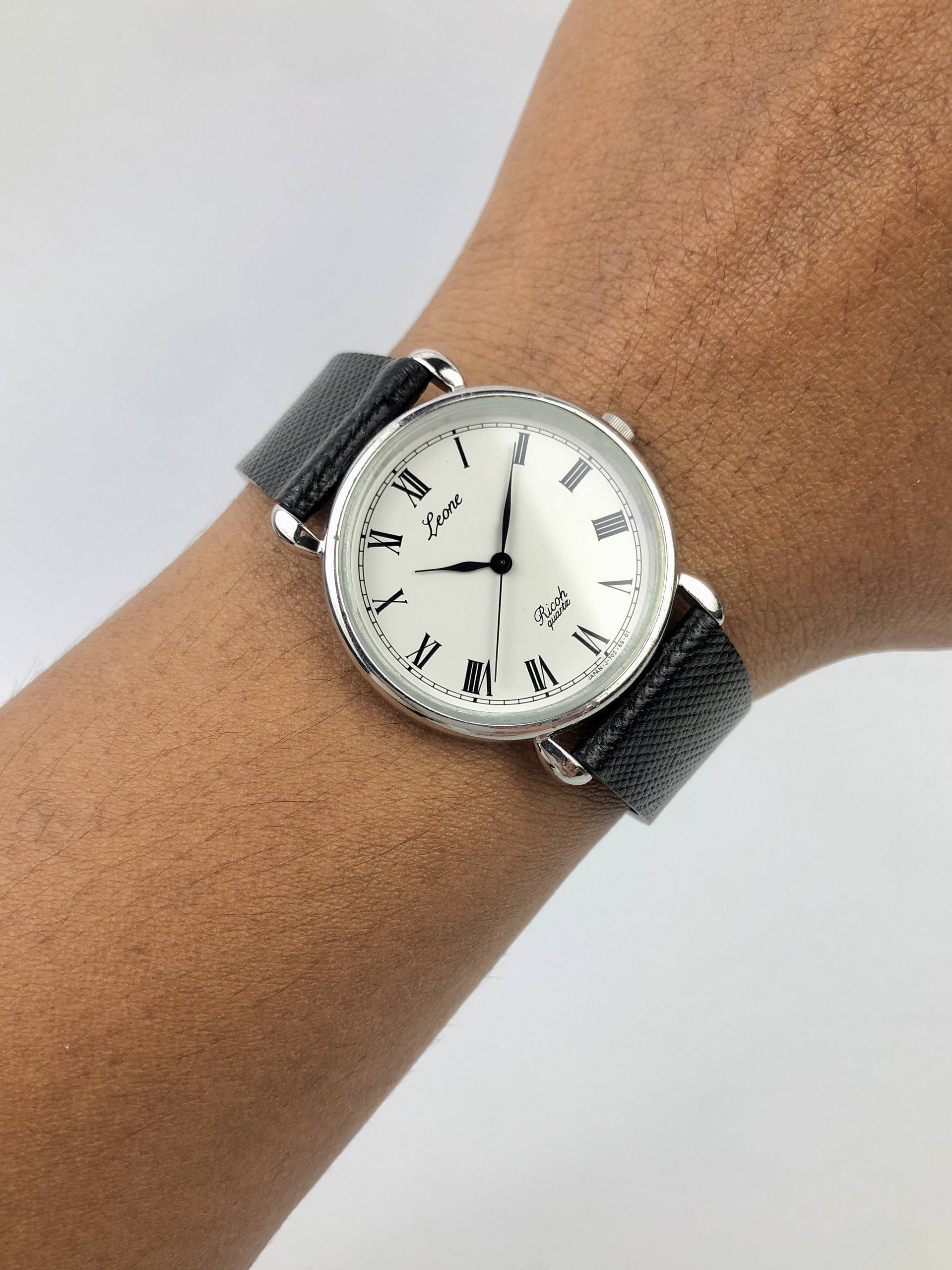 LEONE RICOH QUARTZ WHITE DIAL ROMAN NUMERAL DRESS WATCH