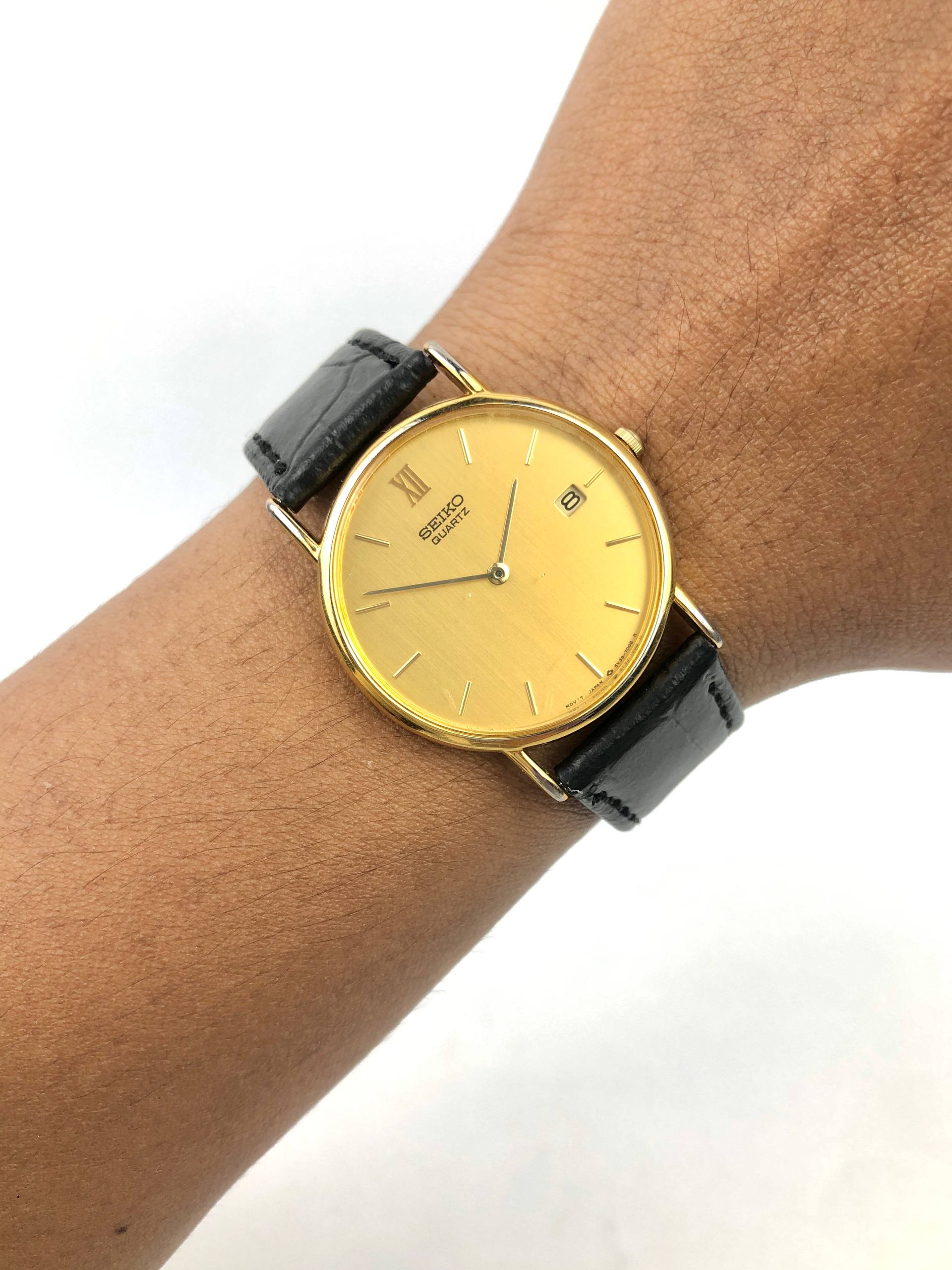 DRESSWATCH SEIKO CAL 5Y39 ANALOG QUARTZ DATE GOLD TONE