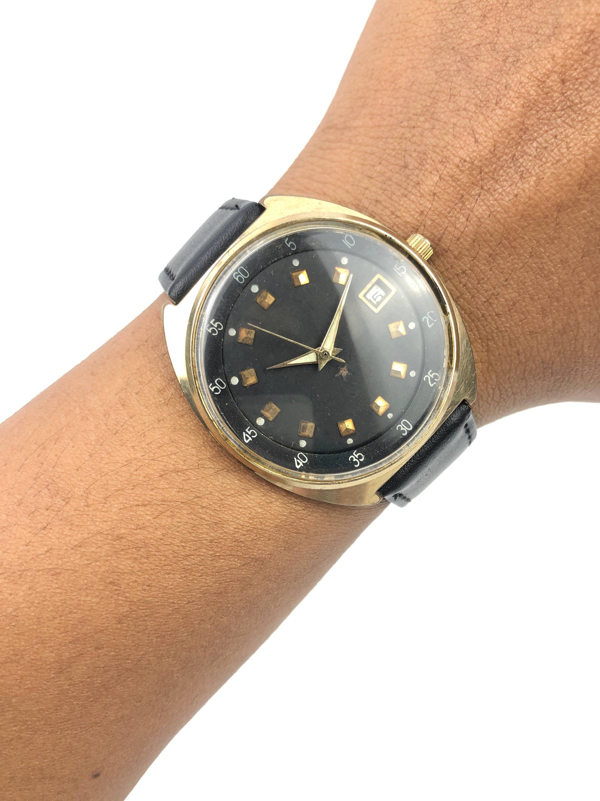 UNSIGNED VINTAGE MANUAL WIND BLACK GILT DIAL DATE WATCH