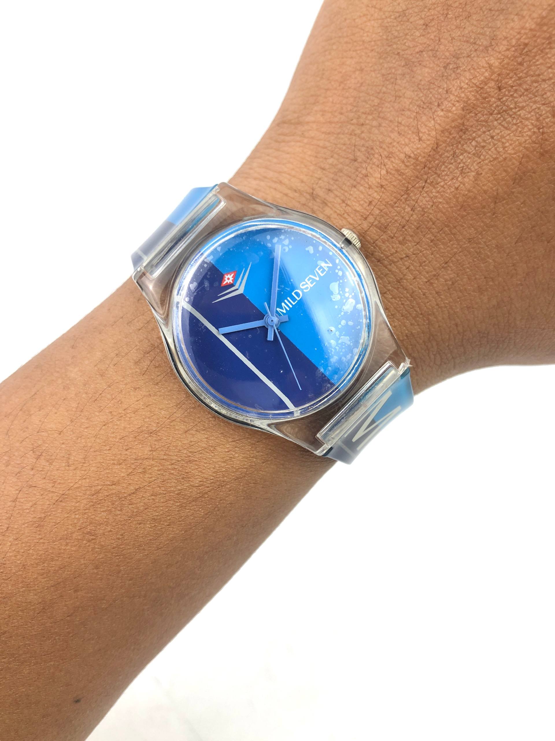MILD SEVEN PROMOTIONAL BLUE DIAL TRANSPARENT CASE QUARTZ WATCH