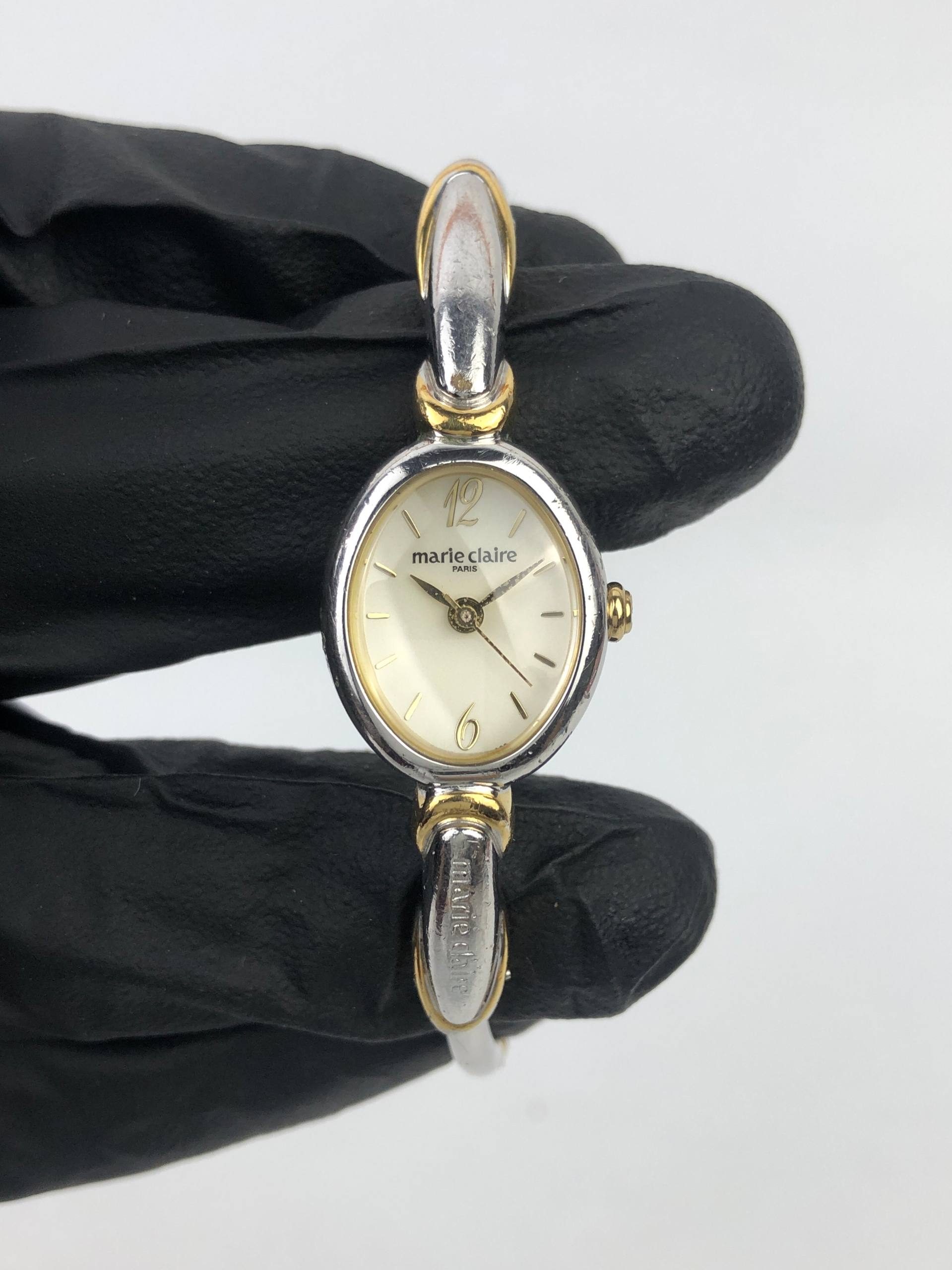 MARIE CLAIRE LADIES CHAMPAGNE DIAL BANGLE BRACELET WATCH - Gambar 2