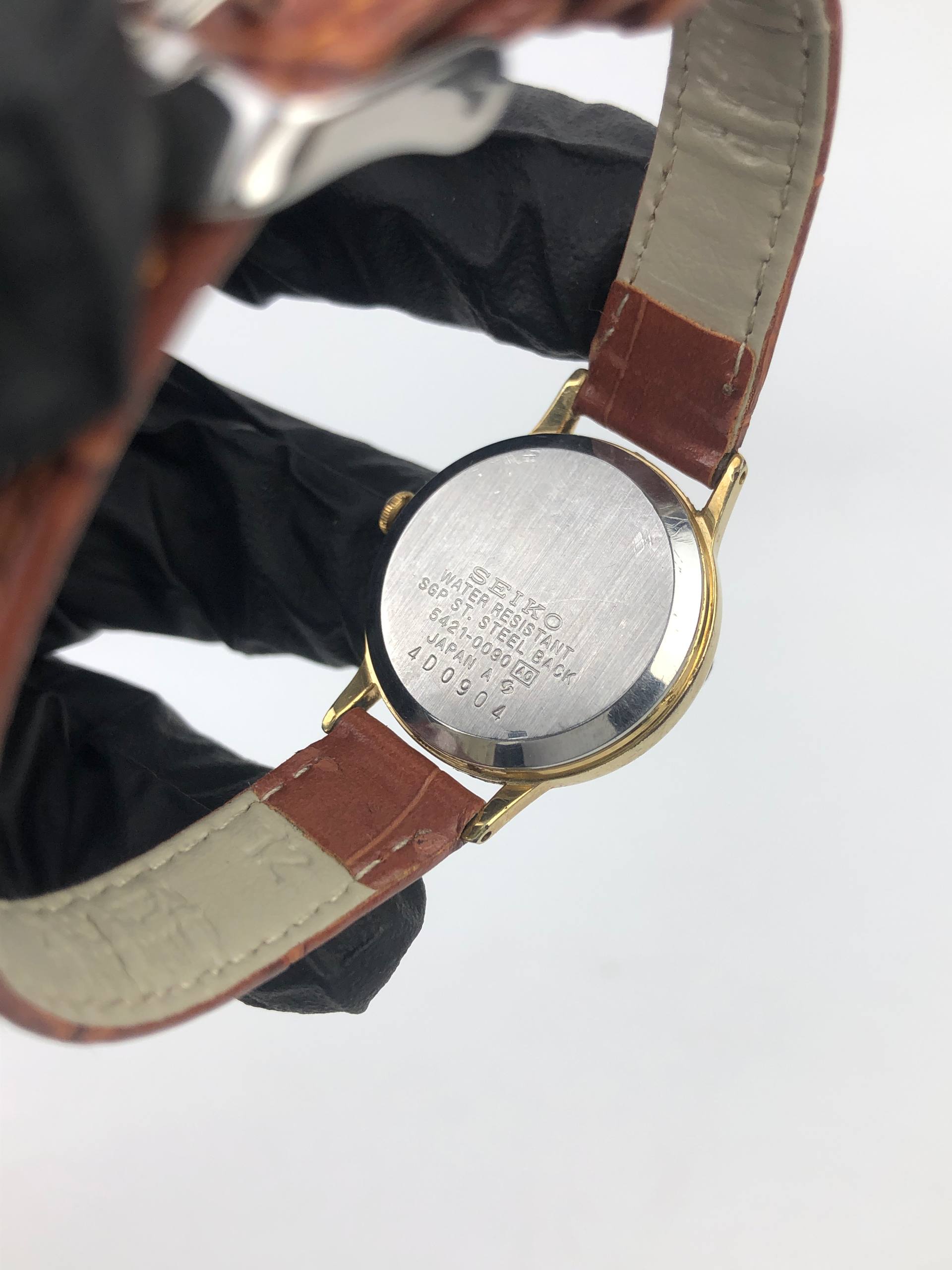 VINTAGE SEIKO QUARTZ CLASSIC WHITE DIAL GOLD TONE DRESS WATCH - Gambar 7
