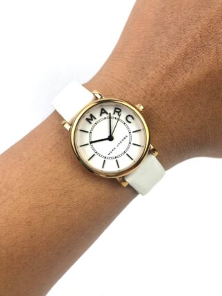 MARC JACOBS QUARTZ GOLD TONE ROUND CASE