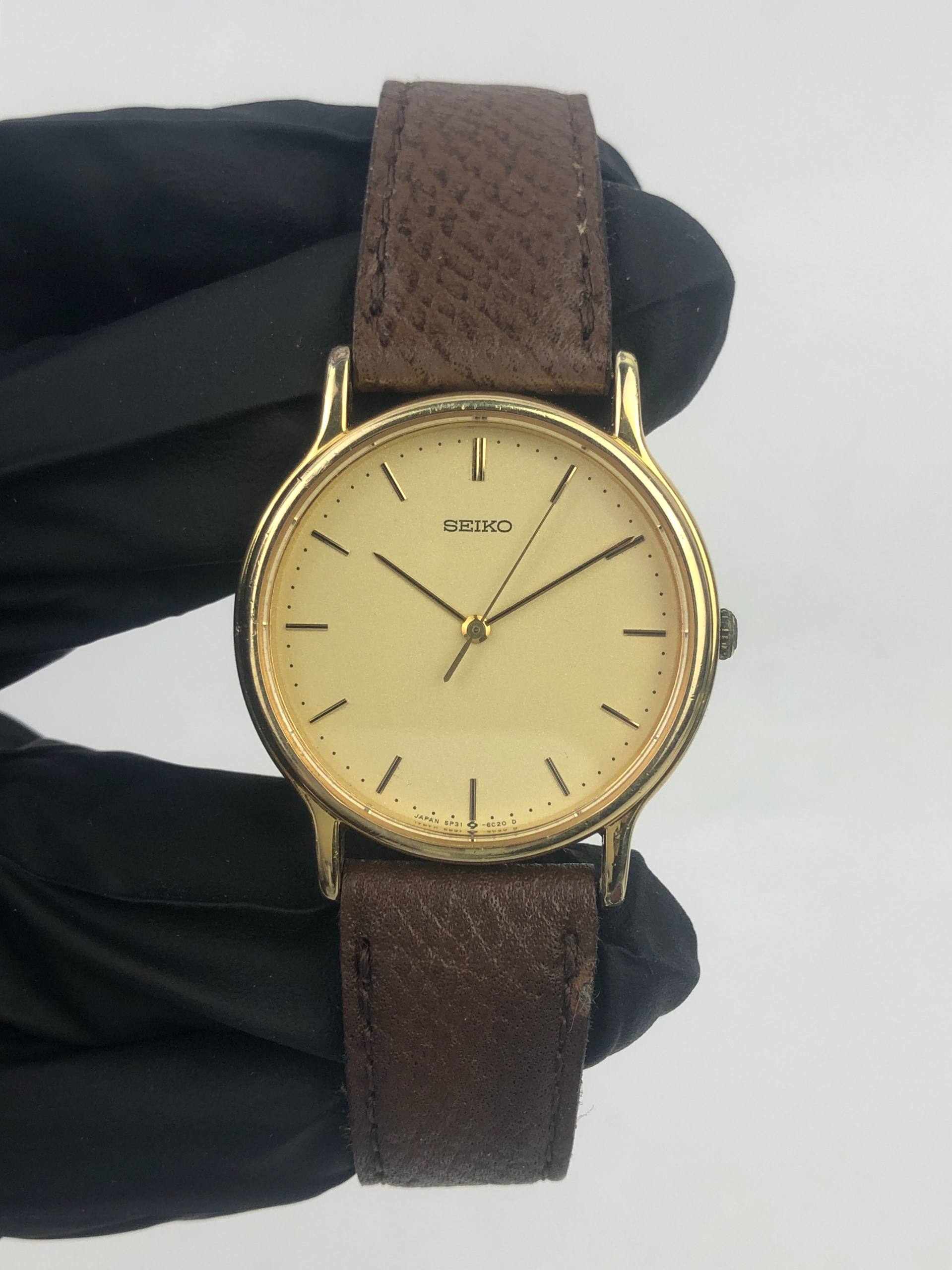 SEIKO QUARTZ 5P31-6N40 GOLD DIAL JAPAN - Gambar 2