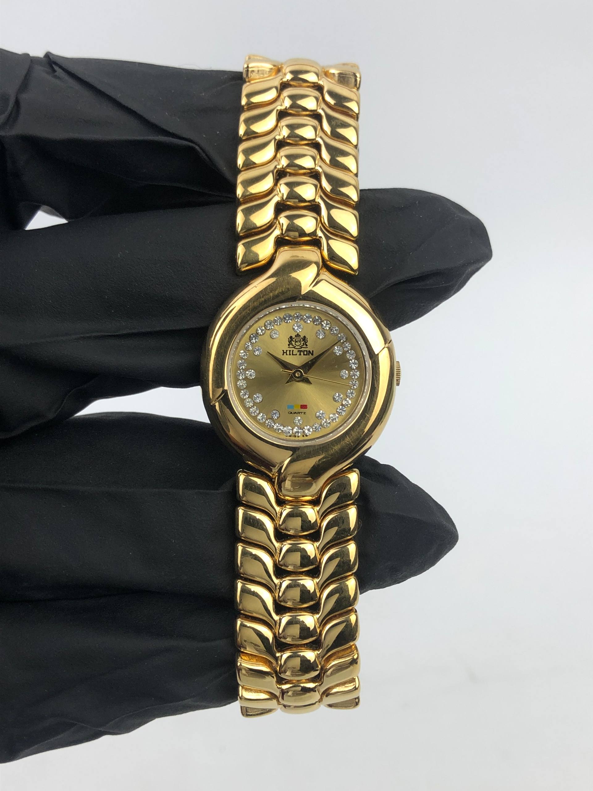 HILTON JEWEL SET DIAL INTEGRATED BRACELET SWISSMADE - Gambar 2