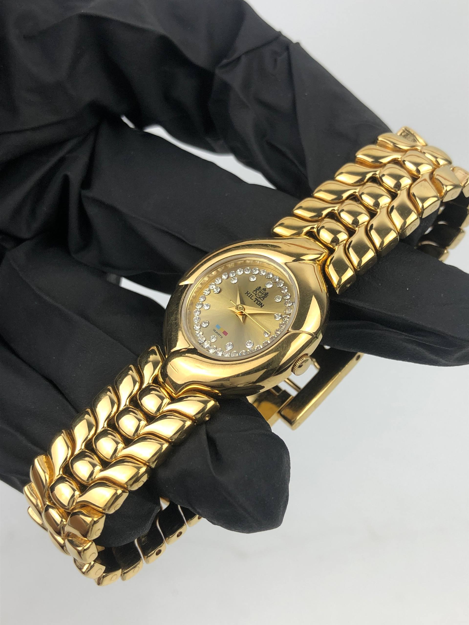 HILTON JEWEL SET DIAL INTEGRATED BRACELET SWISSMADE - Gambar 3