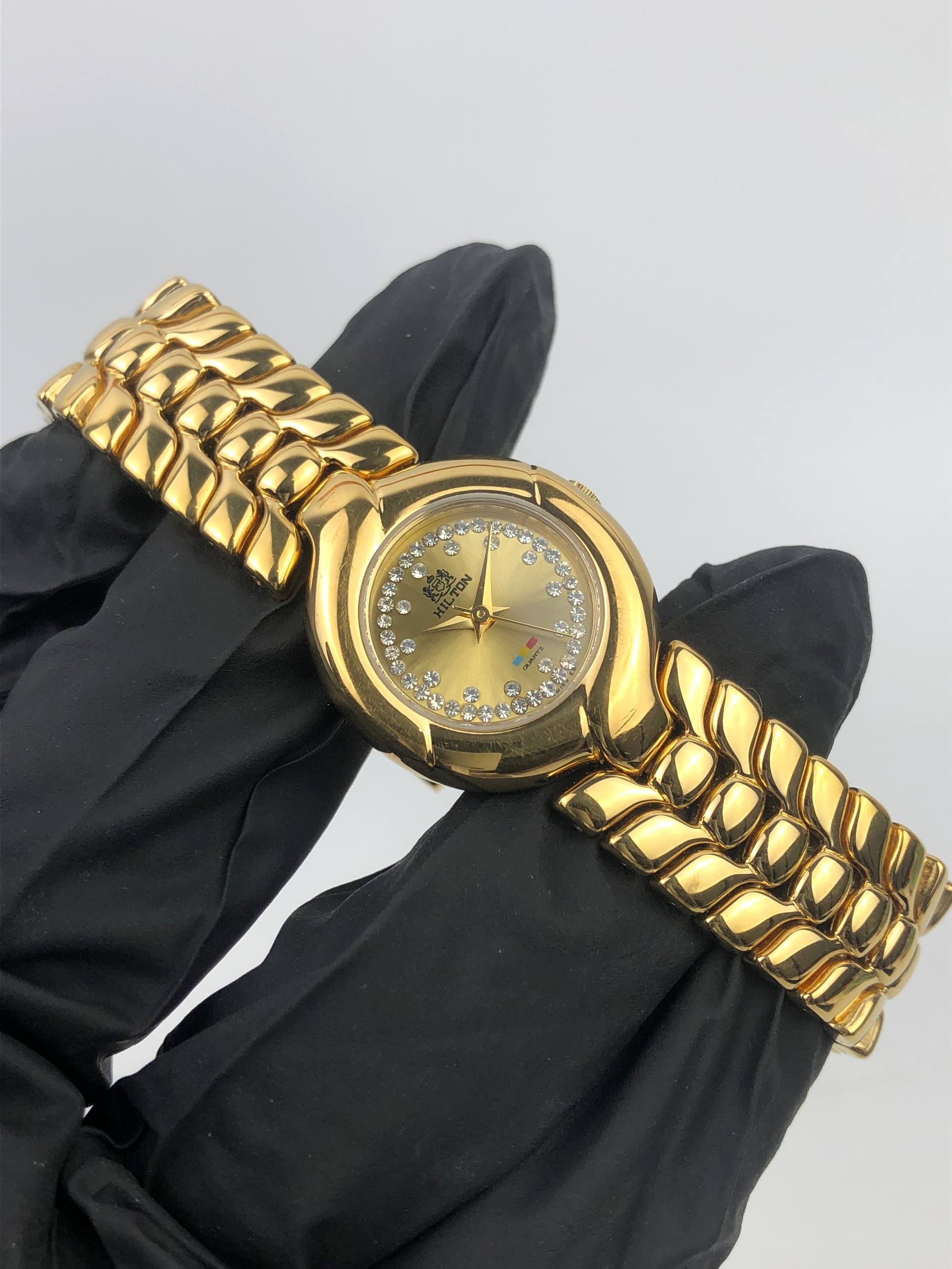 HILTON JEWEL SET DIAL INTEGRATED BRACELET SWISSMADE - Gambar 4