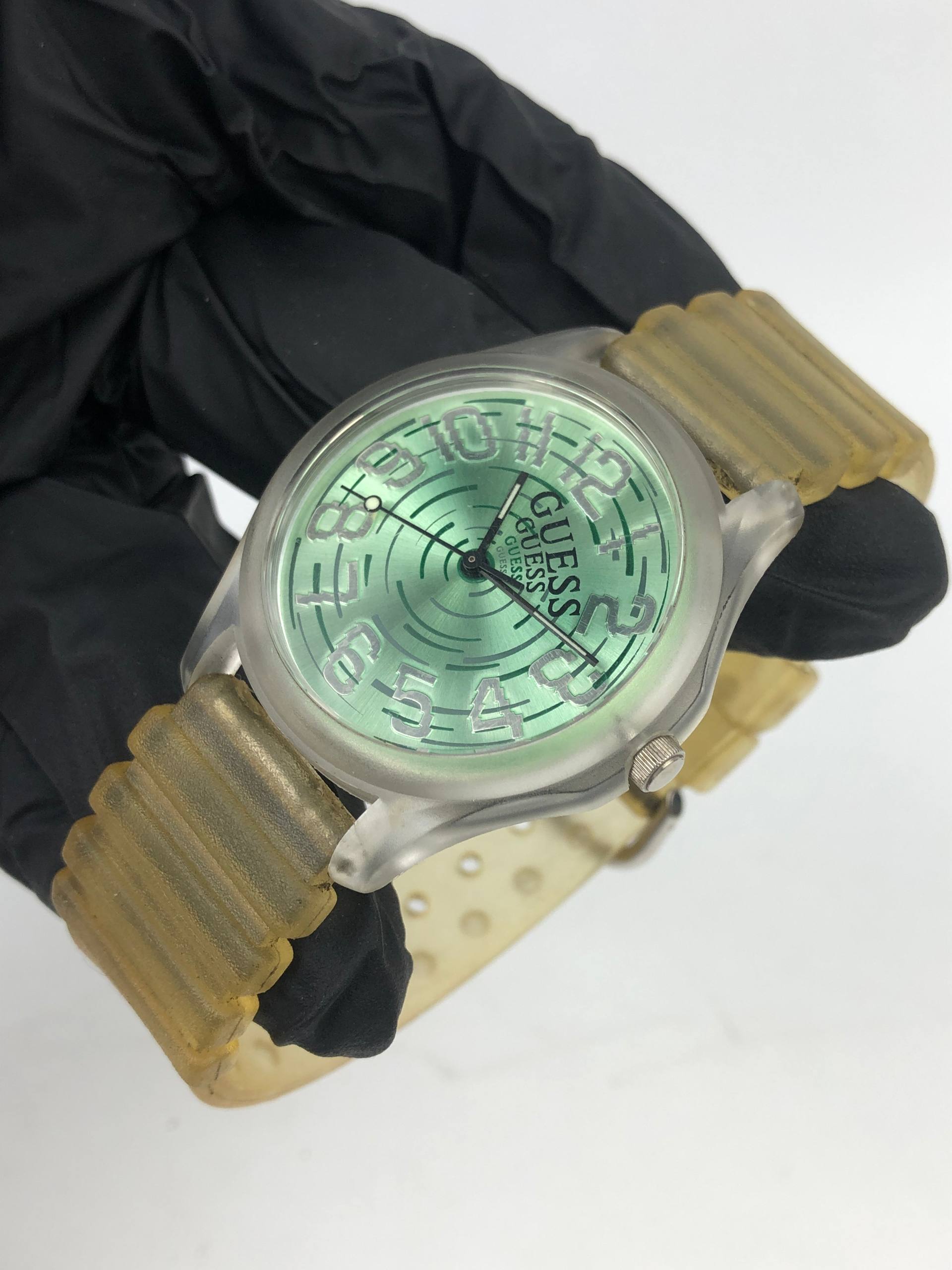 GUESS QUARTZ GREEN FACE CLEAR BAND ORIGINAL - Gambar 3