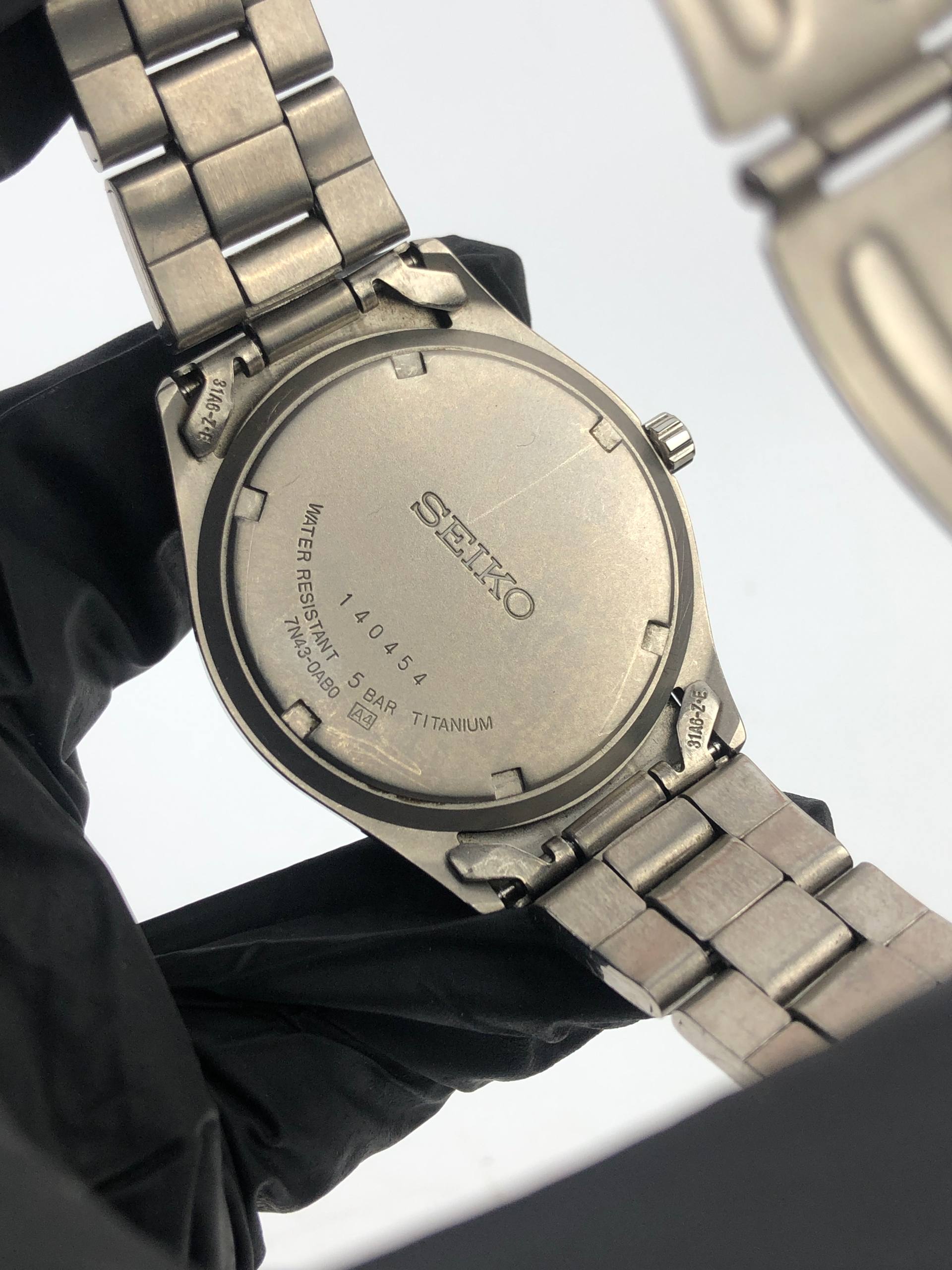 SEIKO 7N42-0AB0 TITANIUM DAYDATE ALL ORIGINAL - Gambar 9