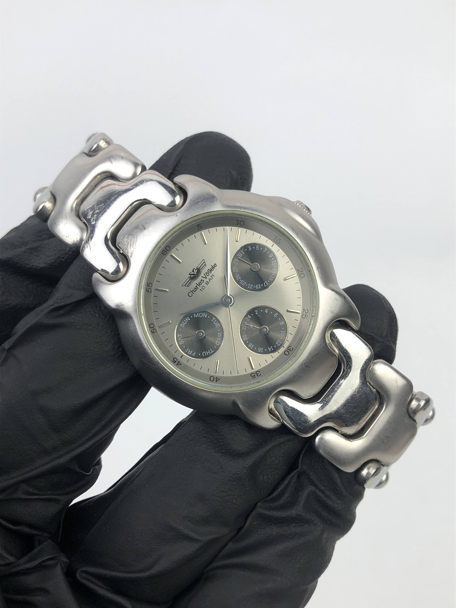 CHARLES VÖGELE MULTIFUNCTION SILVER DIAL DAY DATE 24 HOUR WATCH - Gambar 4