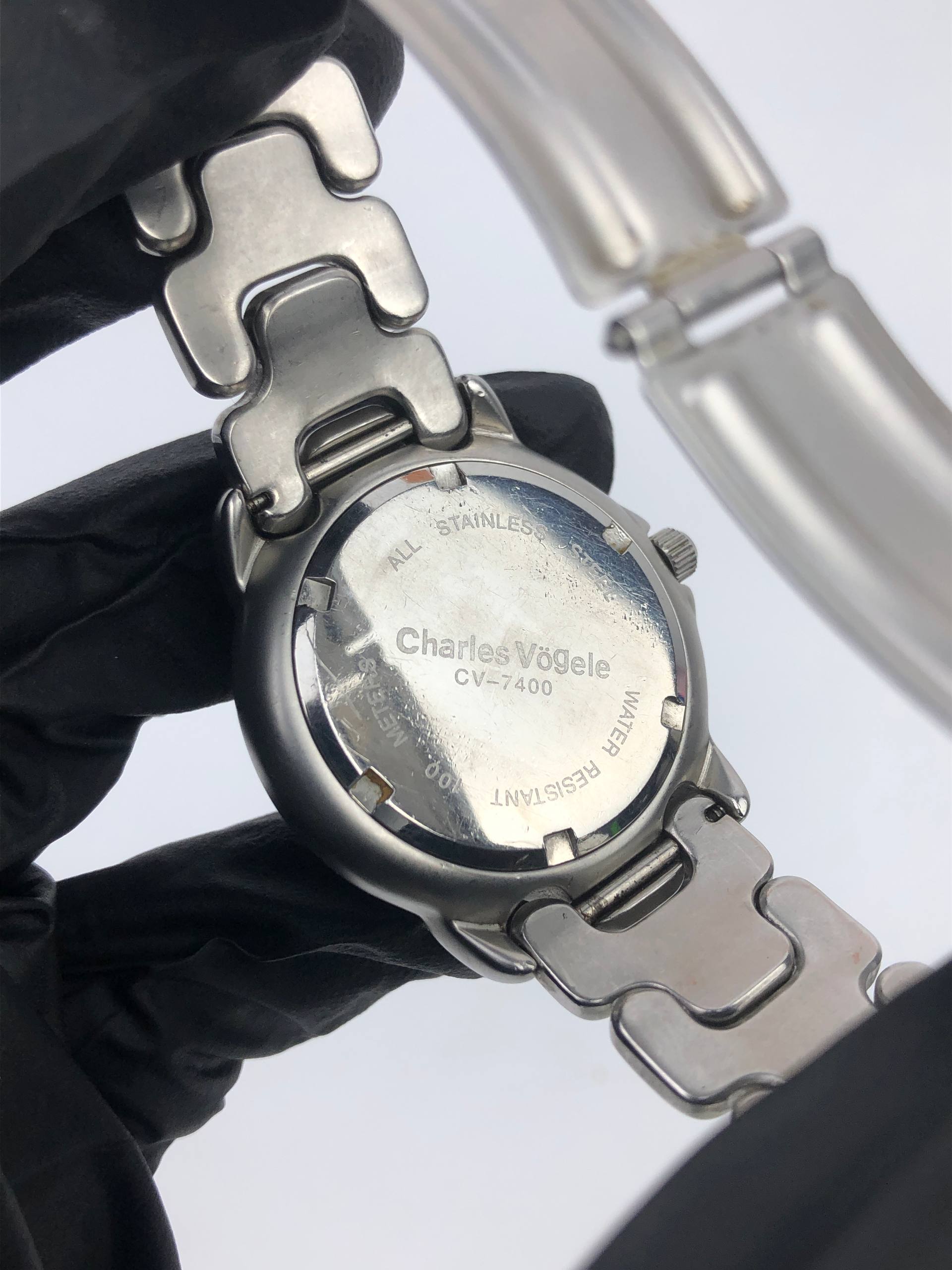 CHARLES VÖGELE MULTIFUNCTION SILVER DIAL DAY DATE 24 HOUR WATCH - Gambar 6