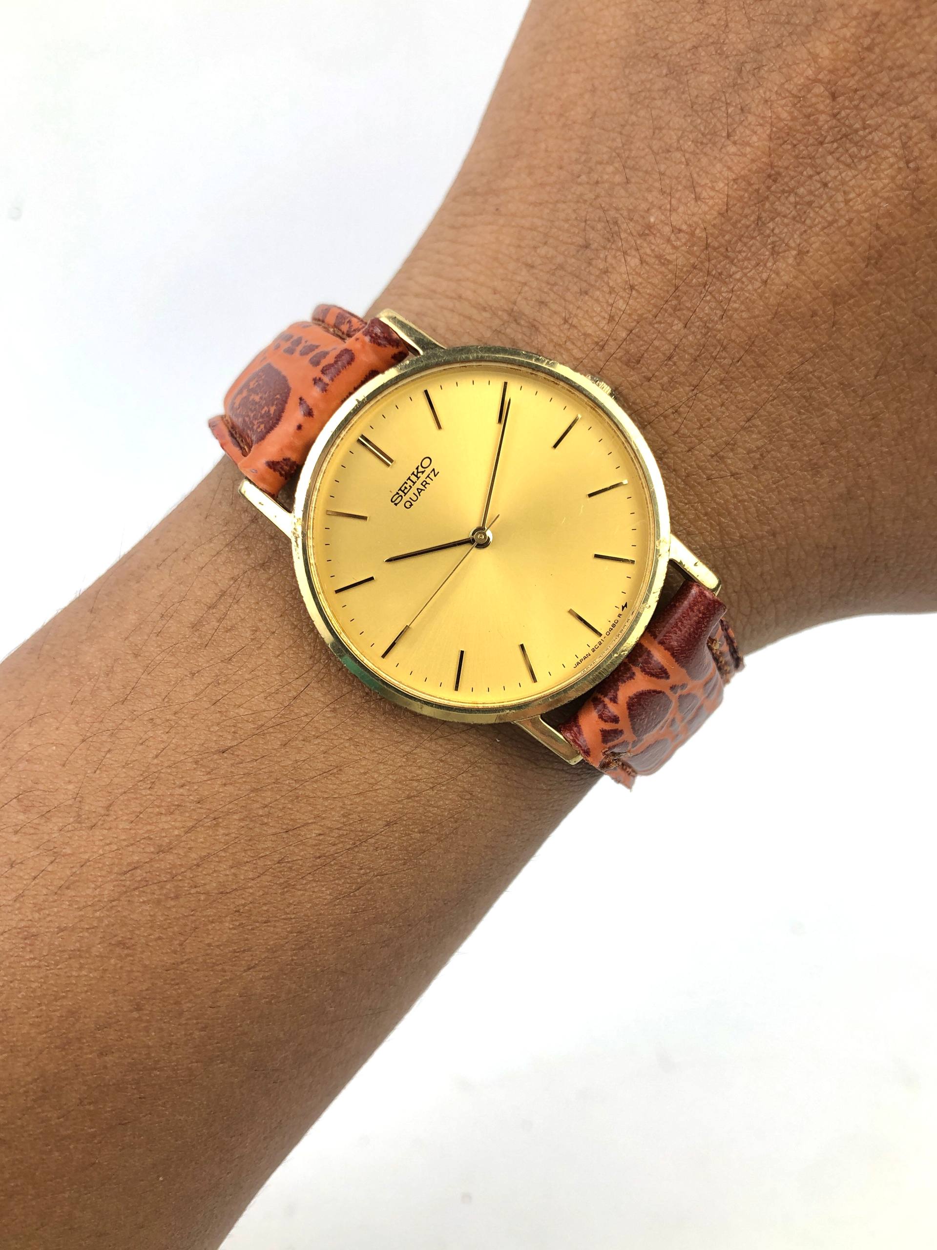 SEIKO QUARTZ 2C21-0120 70TH ANNIVERSARY COMMEMORATIVE GOLD DIAL VINTAGE JAPAN