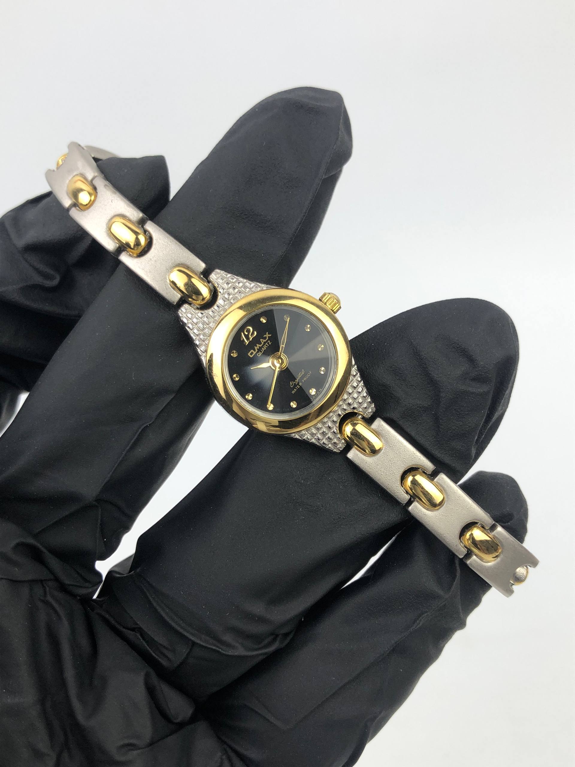 OMAX LADIES QUARTZ BLACK DIAL TWO TONE BRACELET JAPAN MOVEMENT ORIGINAL - Gambar 4