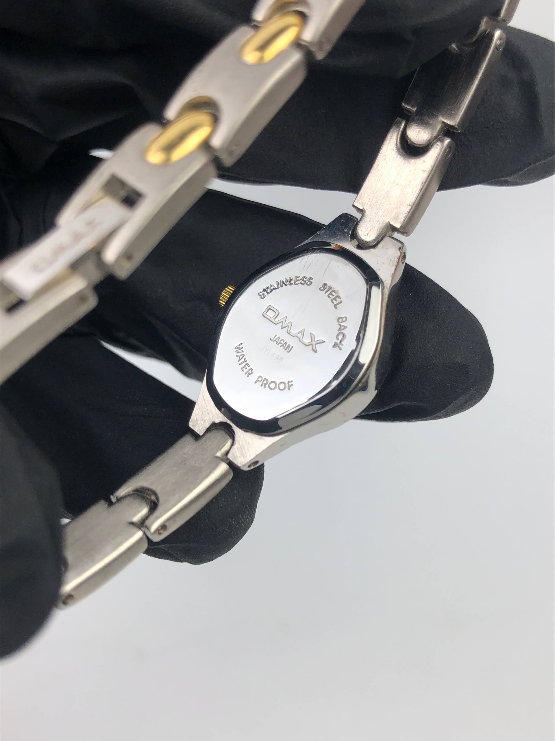 OMAX LADIES QUARTZ BLACK DIAL TWO TONE BRACELET JAPAN MOVEMENT ORIGINAL - Gambar 8