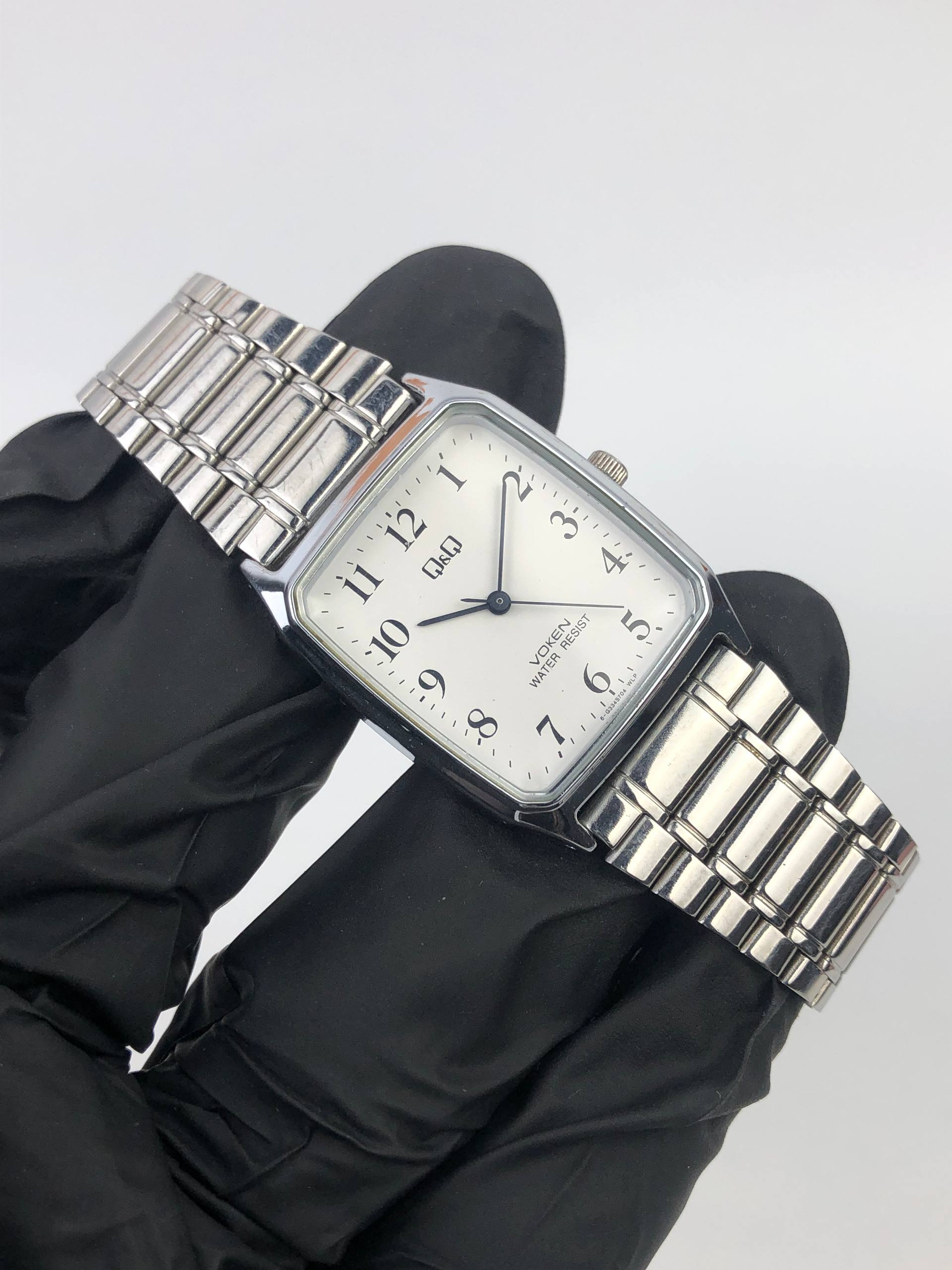 Q&Q QUARTZ JAPAN MOVT DIAL PUTIH ANGKA ARAB BRACELET STAINLESS STEEL - Gambar 4