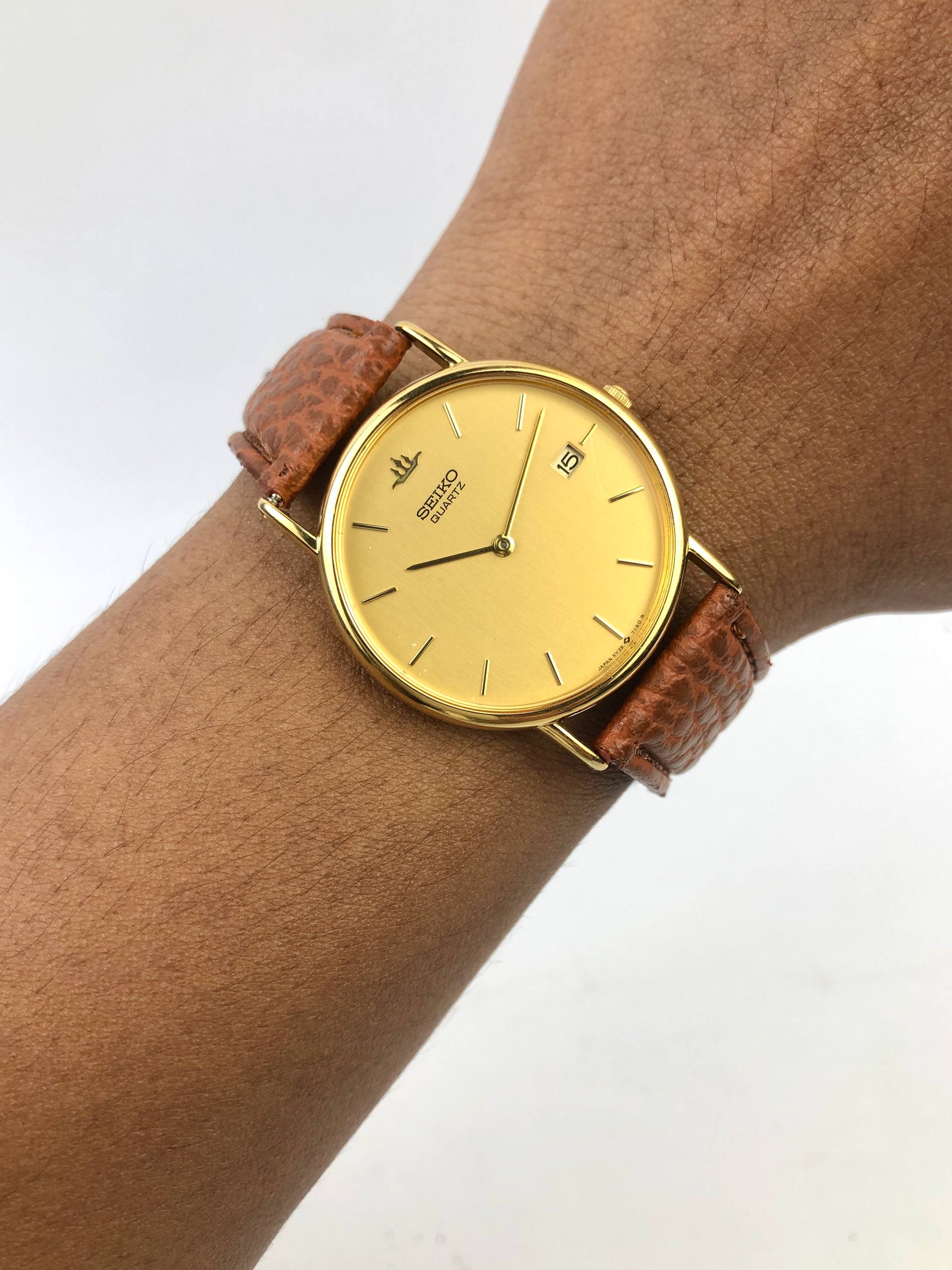 SEIKO QUARTZ GOLD TONE CHAMPAGNE DIAL DATE JAPAN
