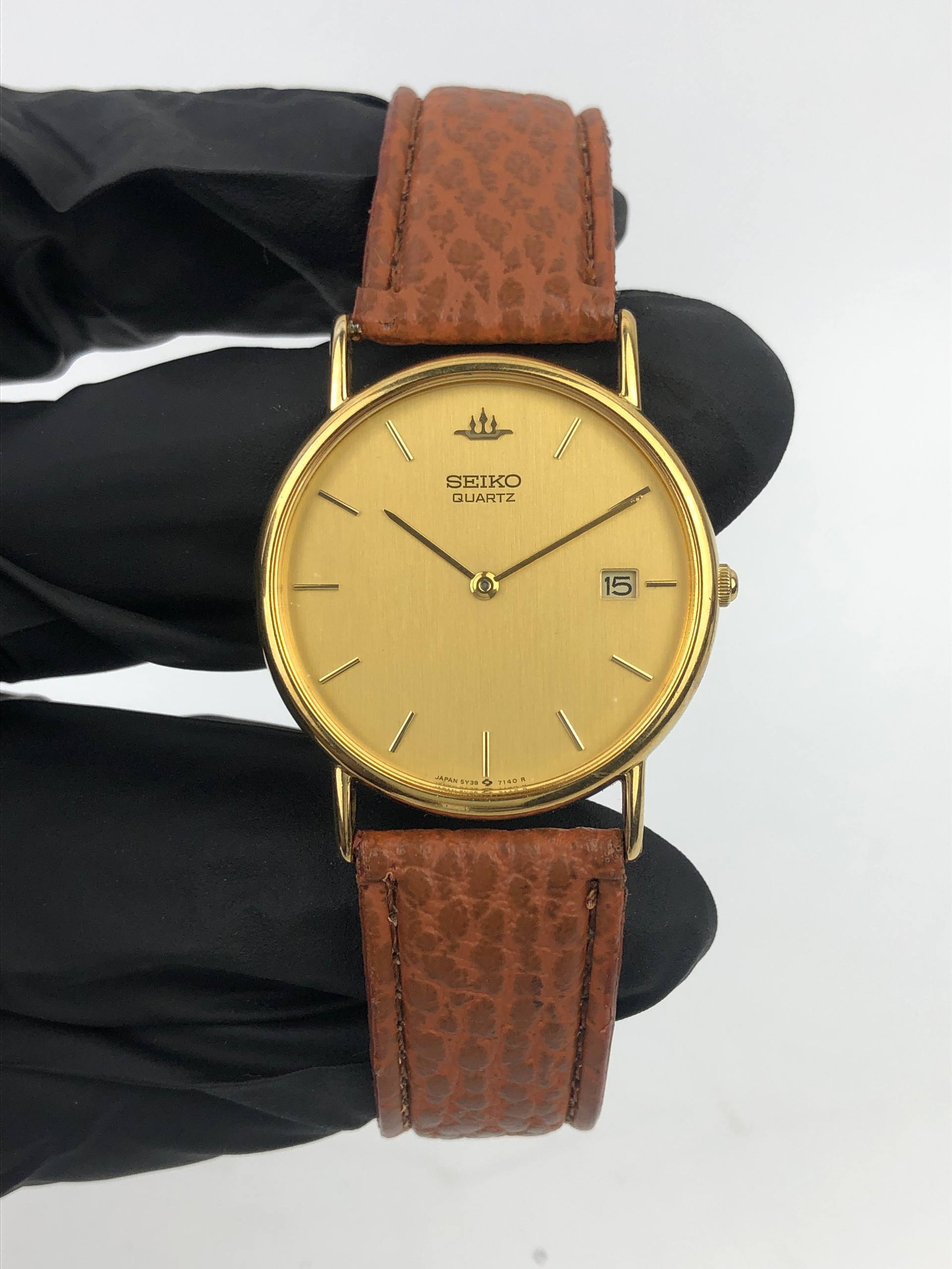 SEIKO QUARTZ GOLD TONE CHAMPAGNE DIAL DATE JAPAN - Gambar 2