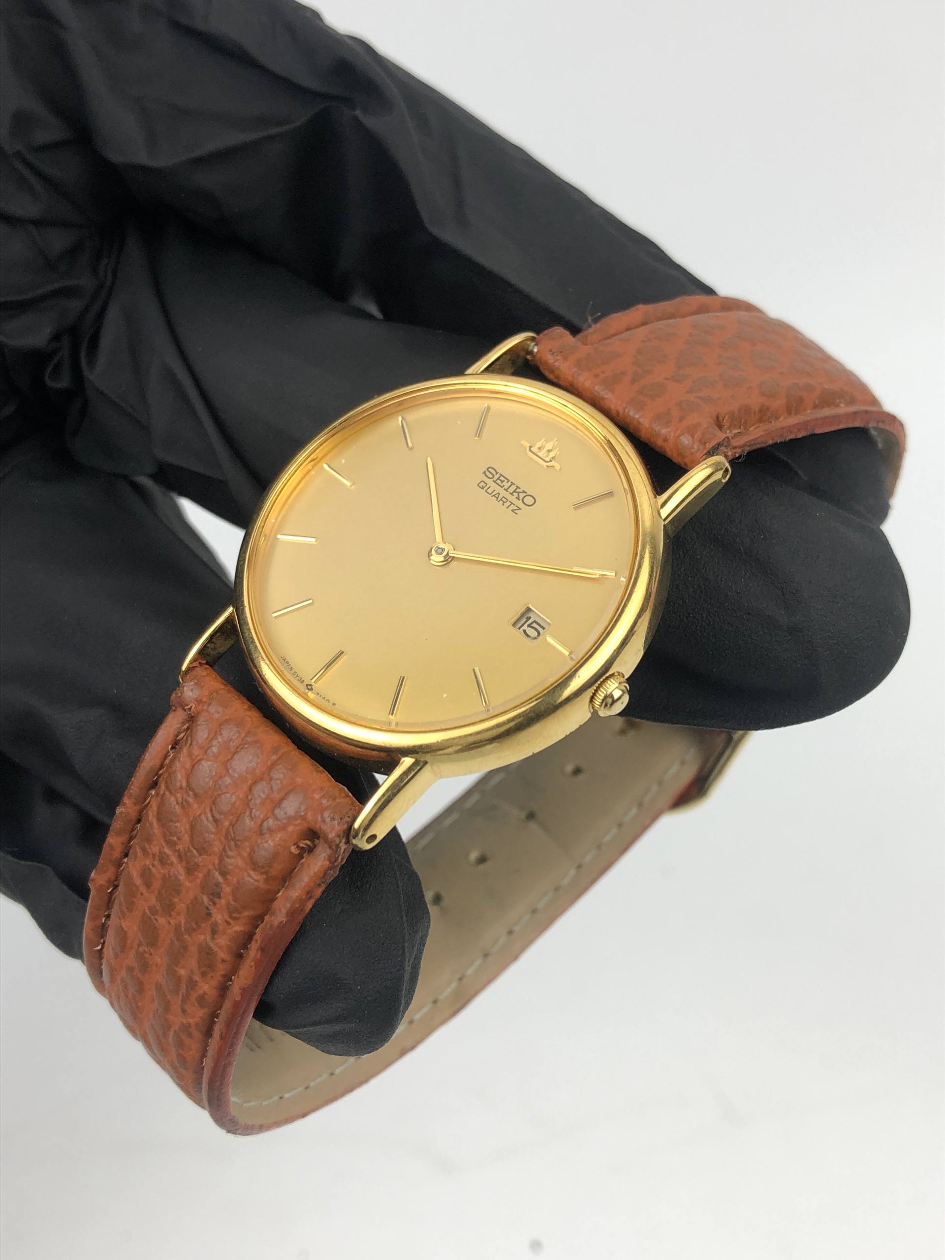 SEIKO QUARTZ GOLD TONE CHAMPAGNE DIAL DATE JAPAN - Gambar 3