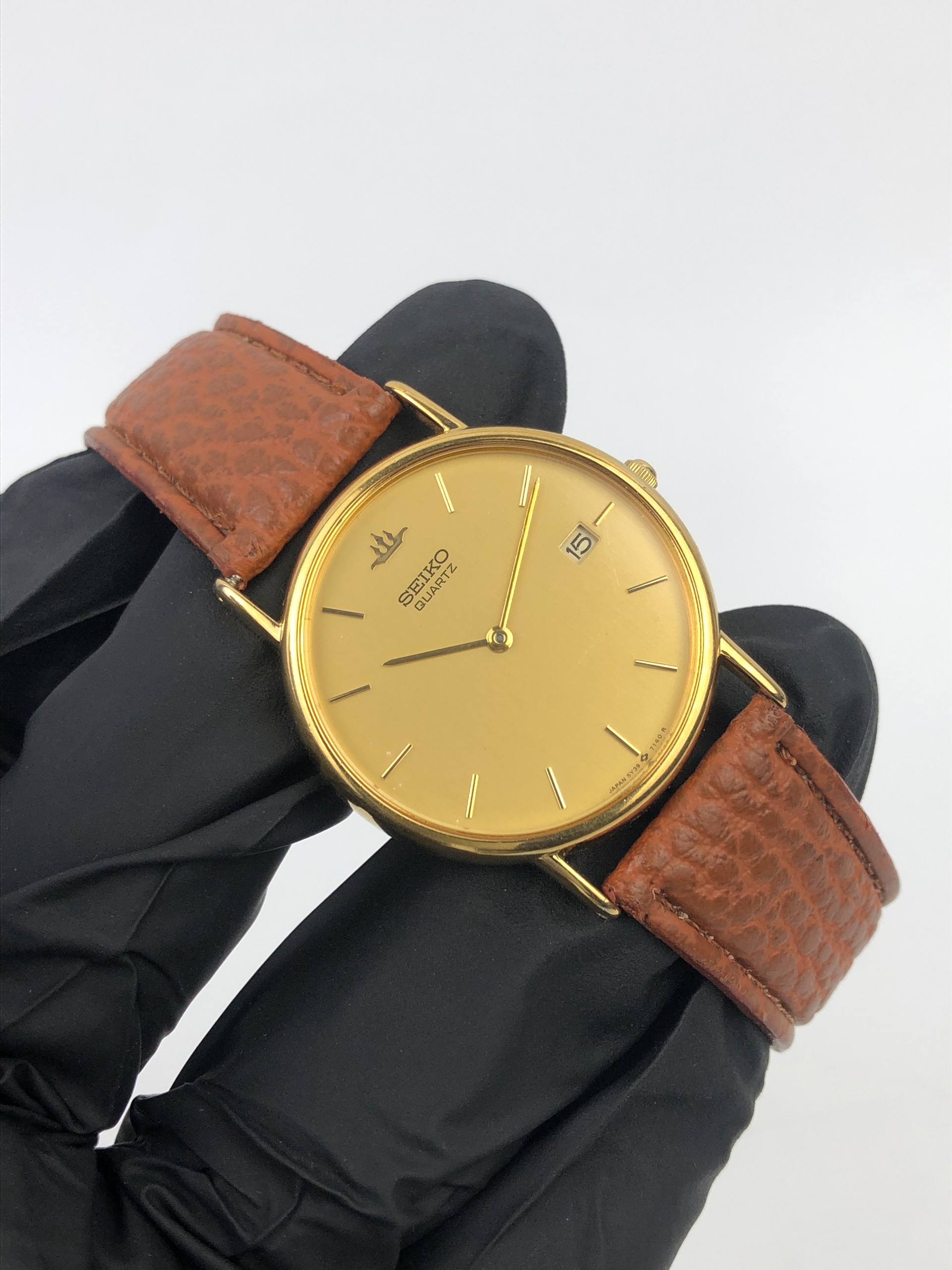 SEIKO QUARTZ GOLD TONE CHAMPAGNE DIAL DATE JAPAN - Gambar 4