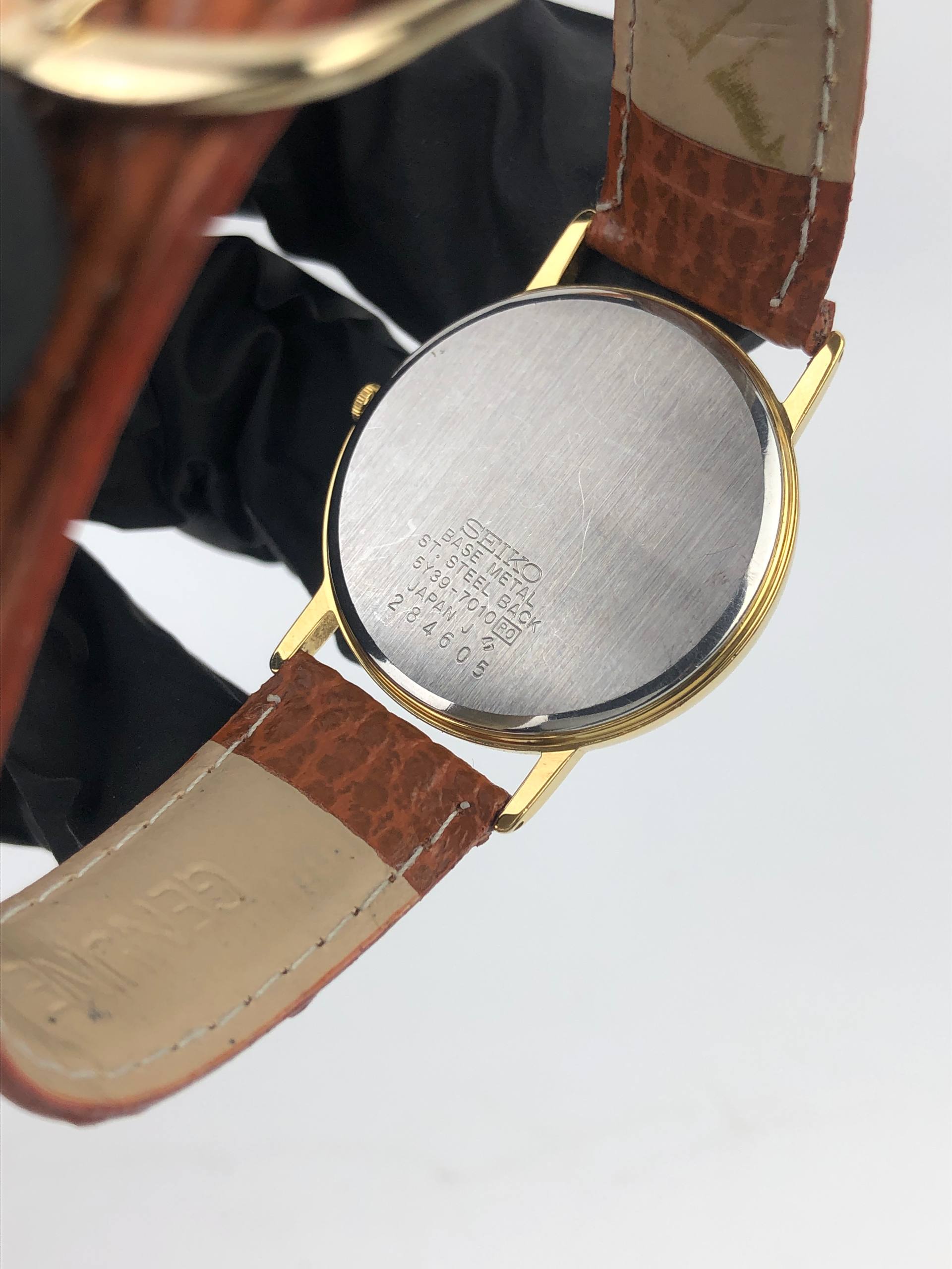 SEIKO QUARTZ GOLD TONE CHAMPAGNE DIAL DATE JAPAN - Gambar 7