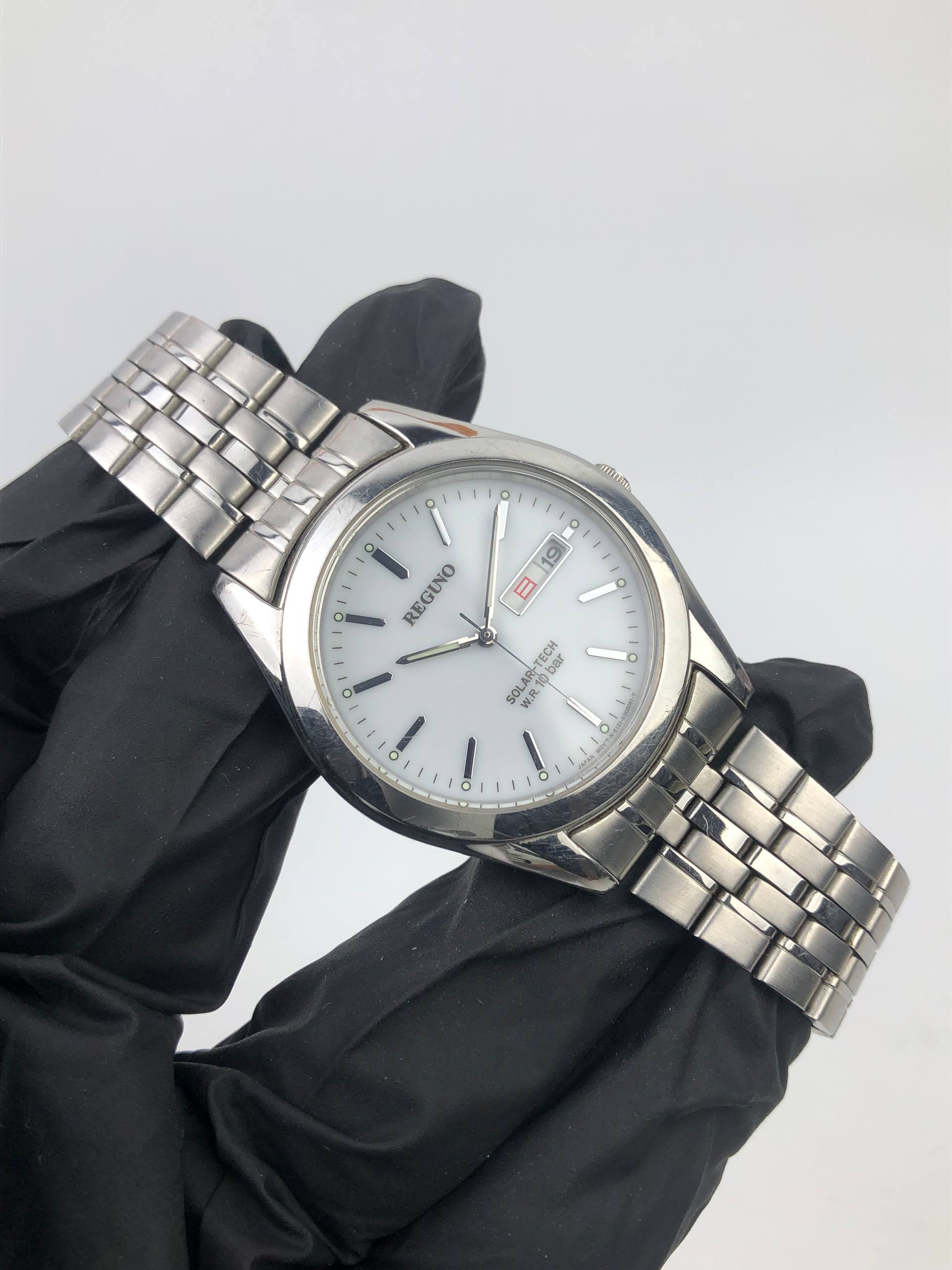 CITIZEN REGUONO E101 SOLAR-TECH QUARTZ JAPAN 10 BAR DATE STAINLESS - Gambar 4