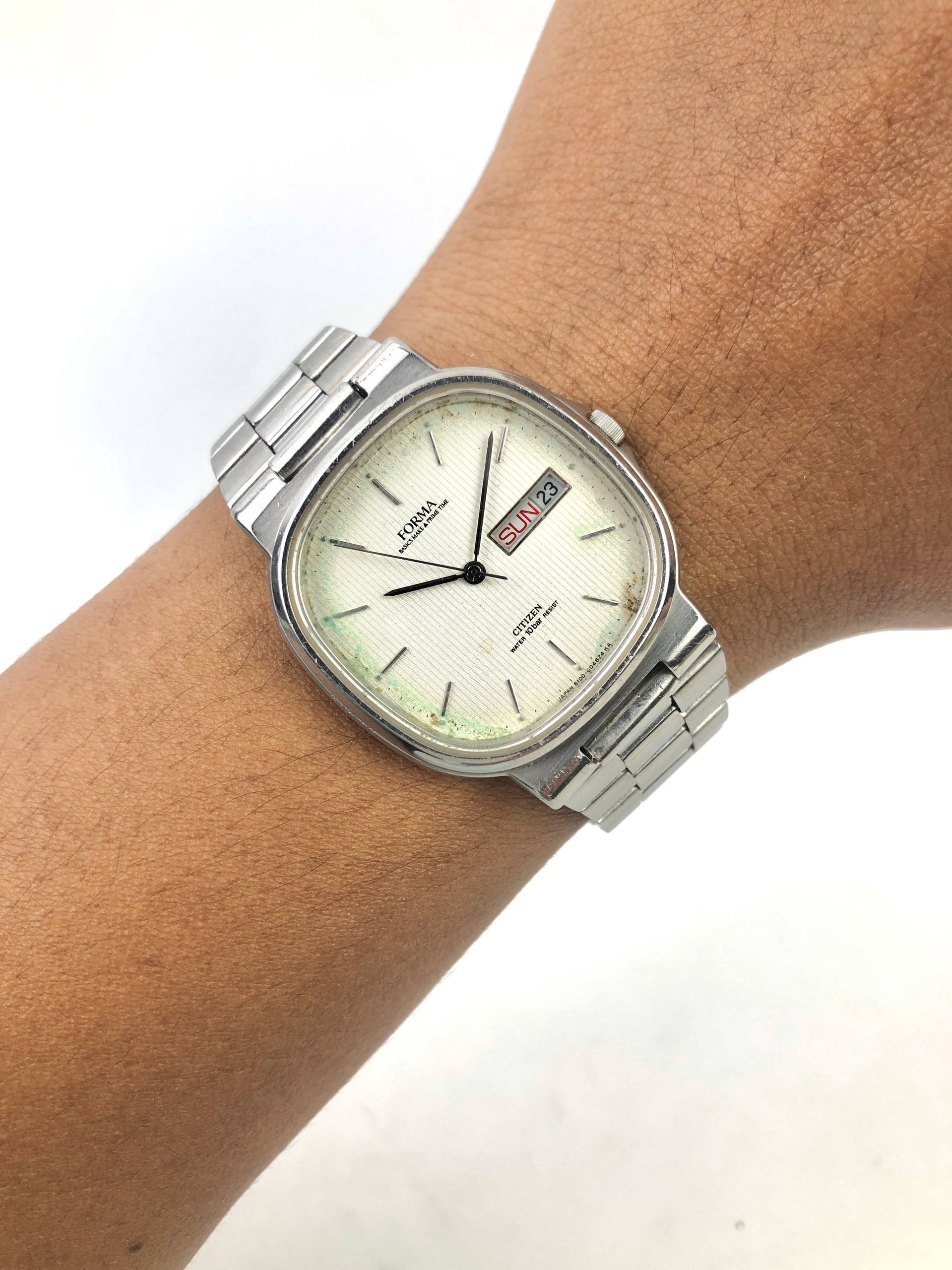 CITIZEN FORMA TV DAYDATE AGING DIAL