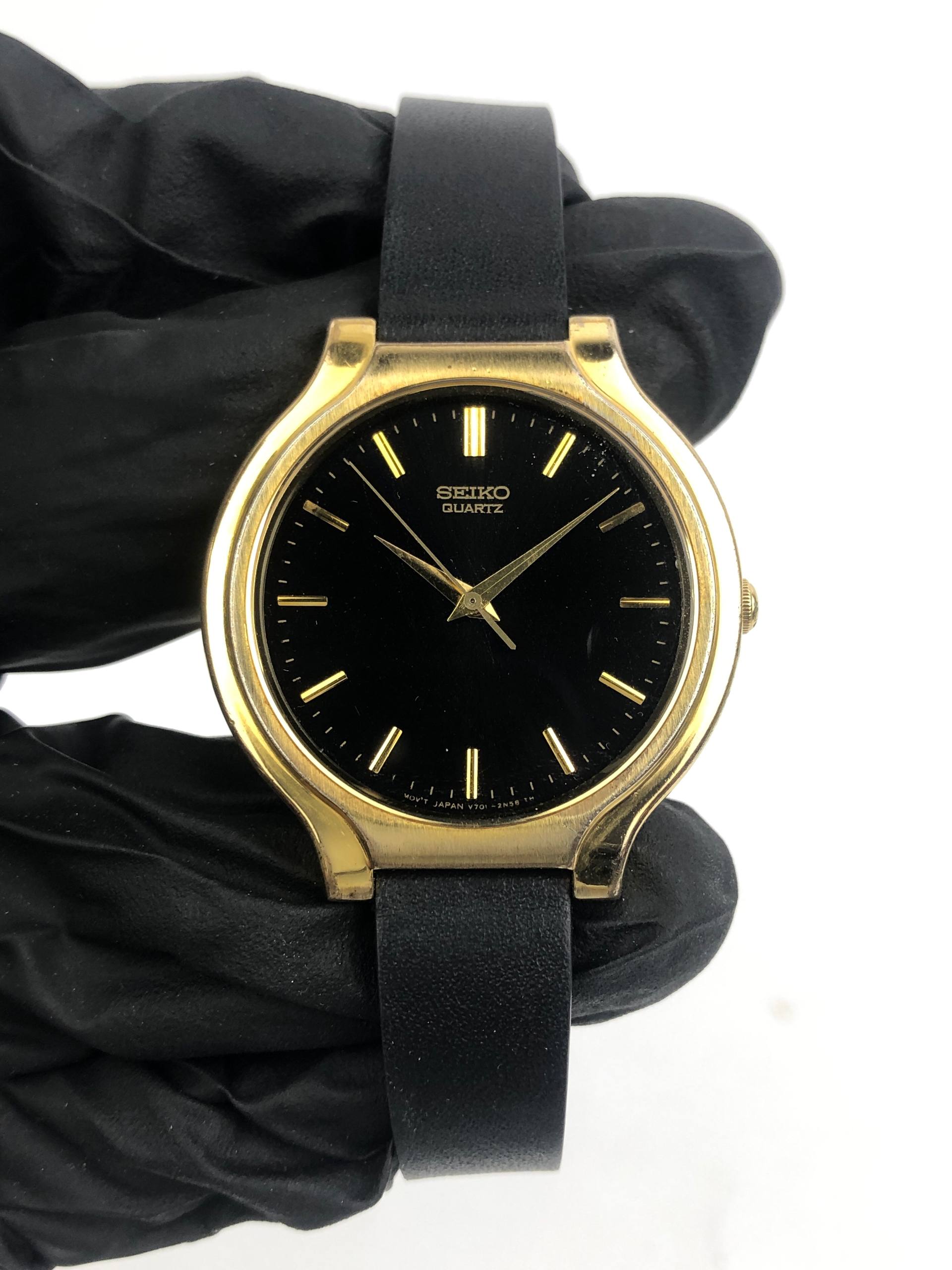 DRESSWATCH SEIKO V701-6K00 QUARTZ GOLD BLACK DIAL - Gambar 2