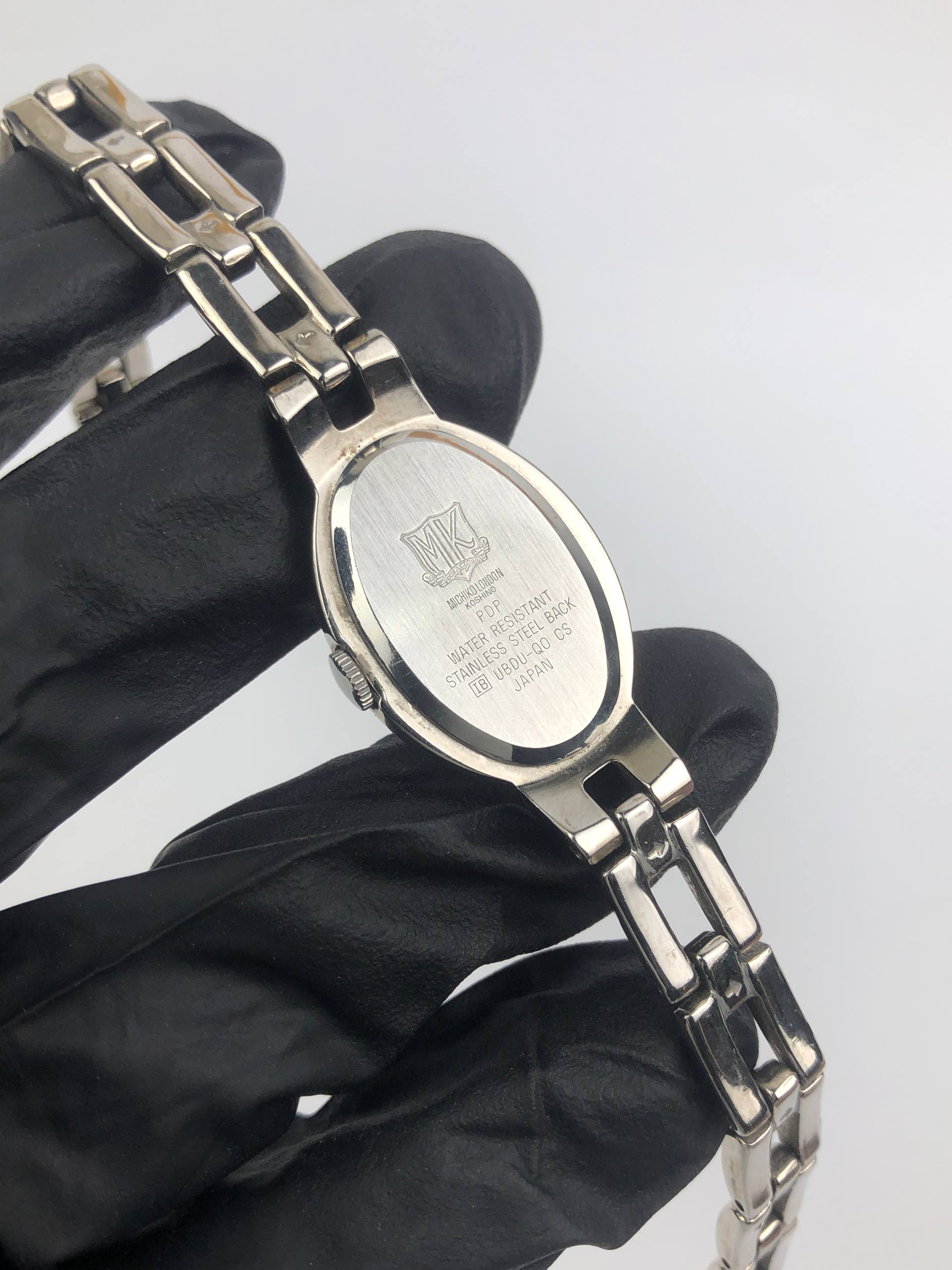 MICHIKO LONDON PALADIUM CASE BANGLE WATCH - Gambar 7