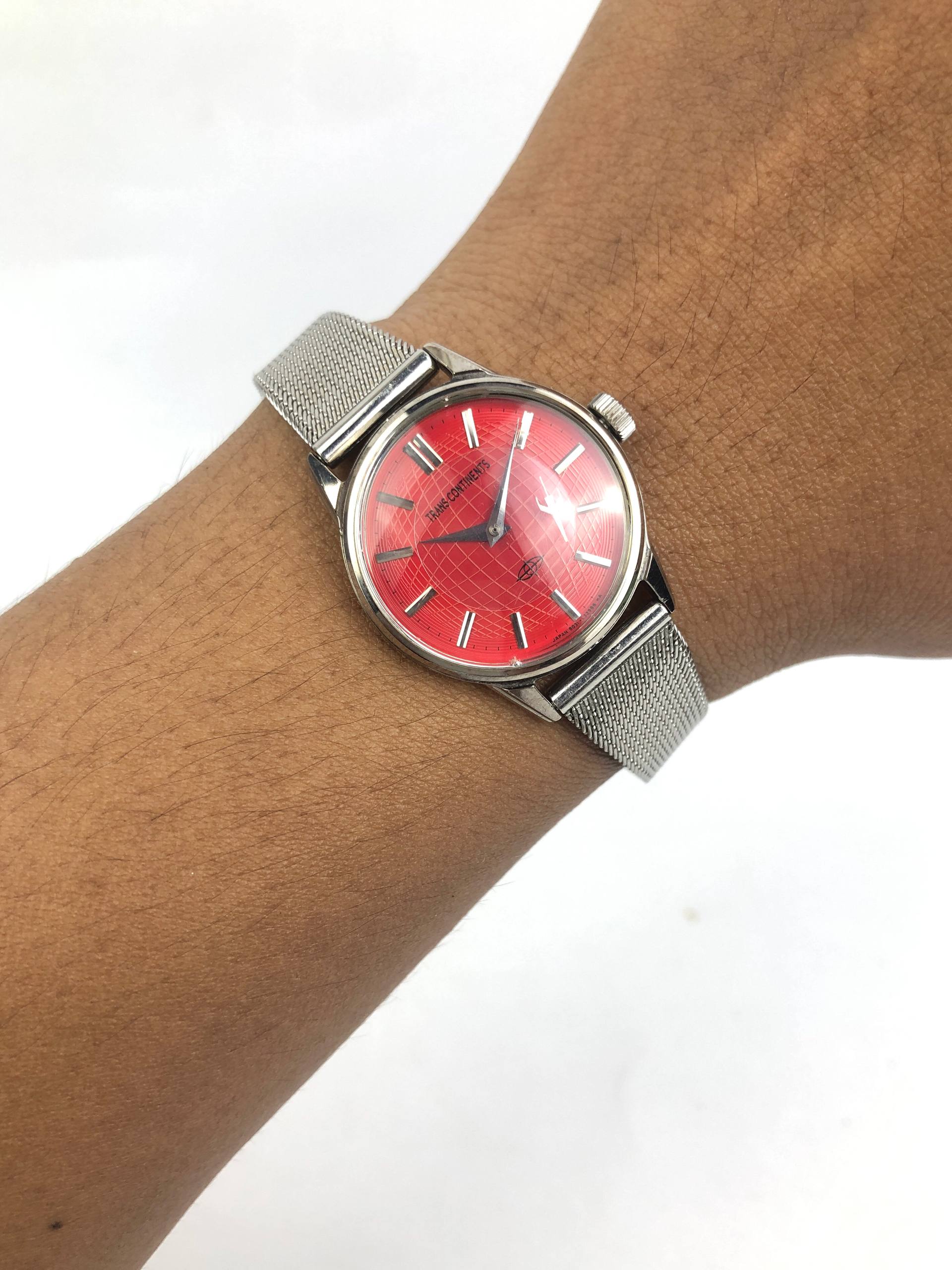 CITIZEN TRANS CONTINETS RED DIAL FLOATING SECOND