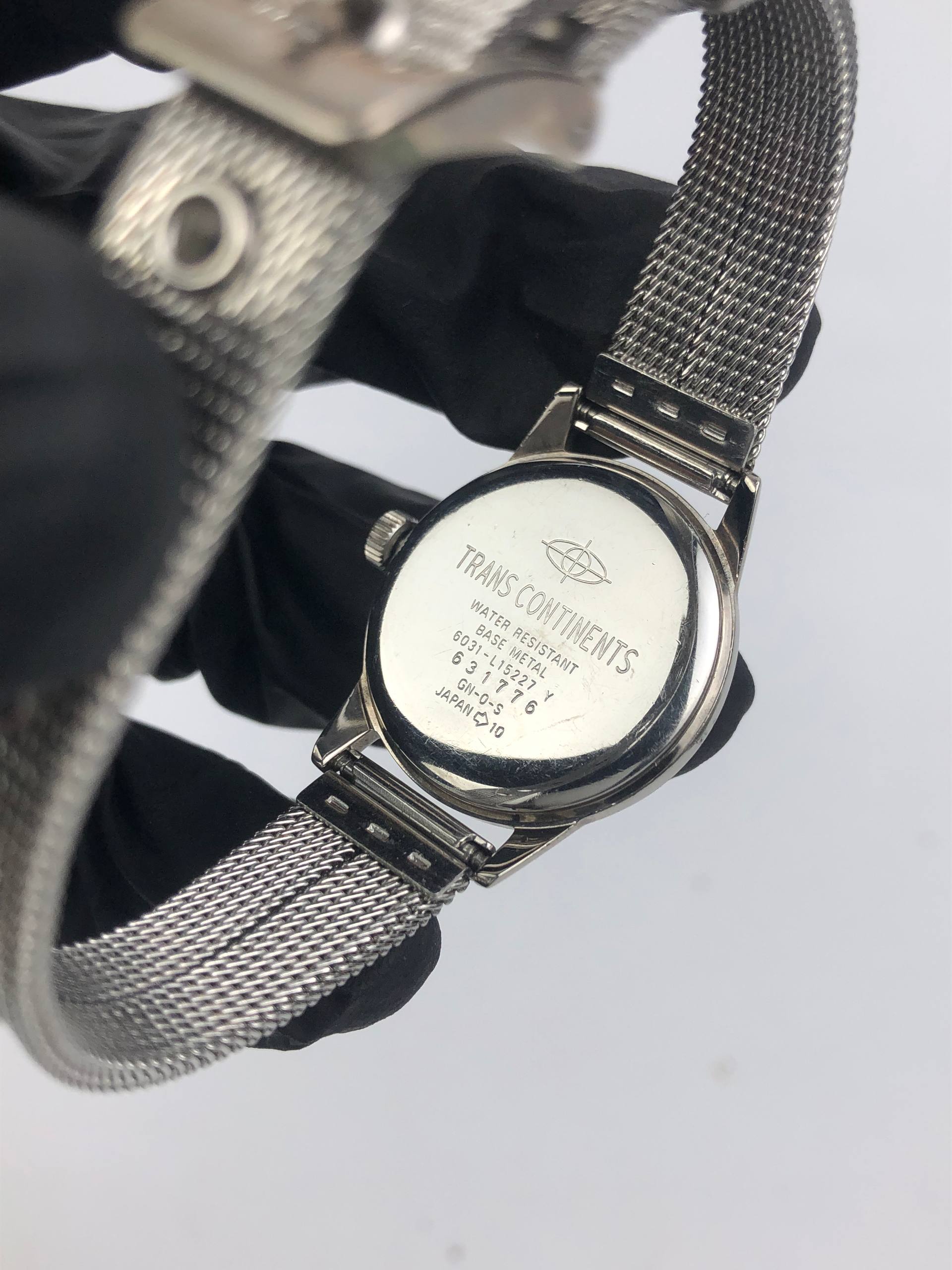 CITIZEN TRANS CONTINETS RED DIAL FLOATING SECOND - Gambar 7